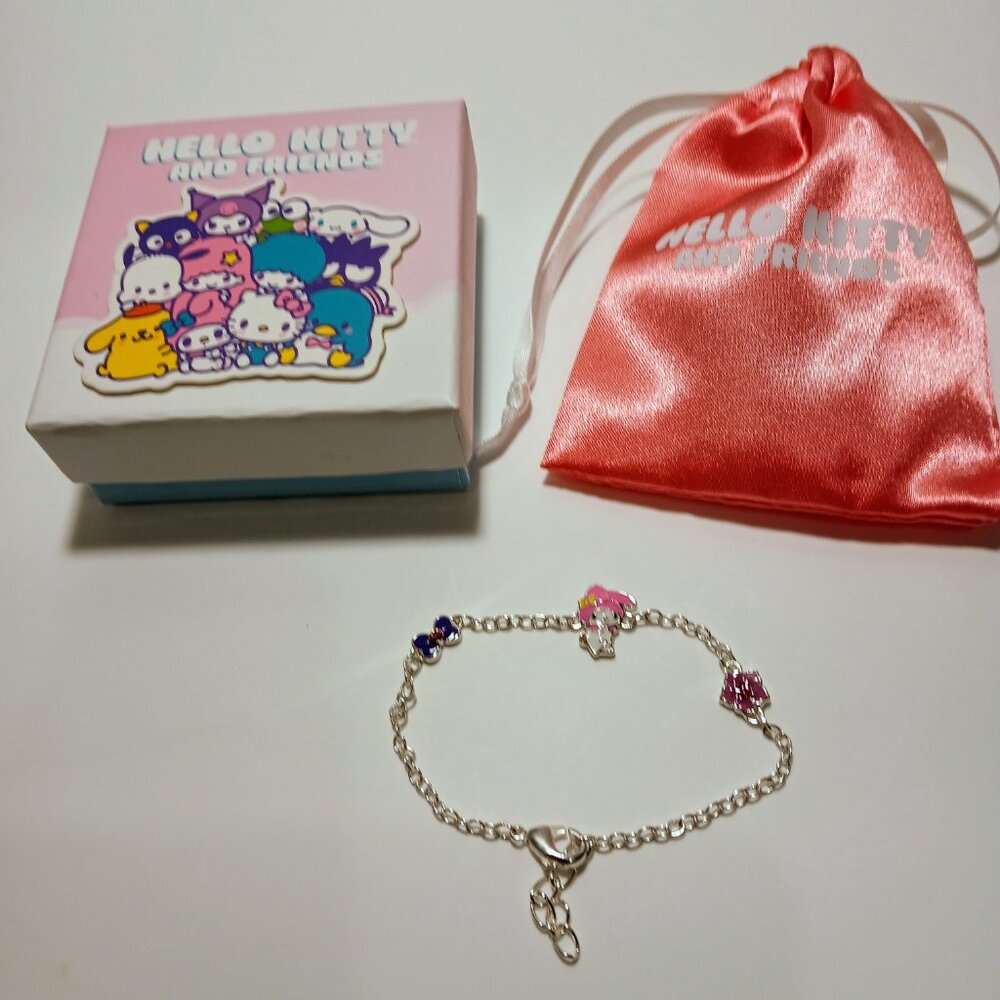 Sanrio and Friends Womens Silver Plated Bracelet with Flower & Bow Charm Pendant